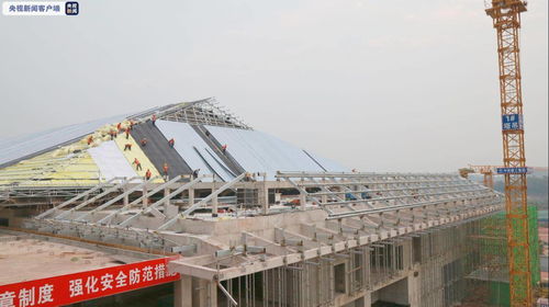 年內(nèi)全線開通 中老鐵路國內(nèi)段站房主體工程今日完工